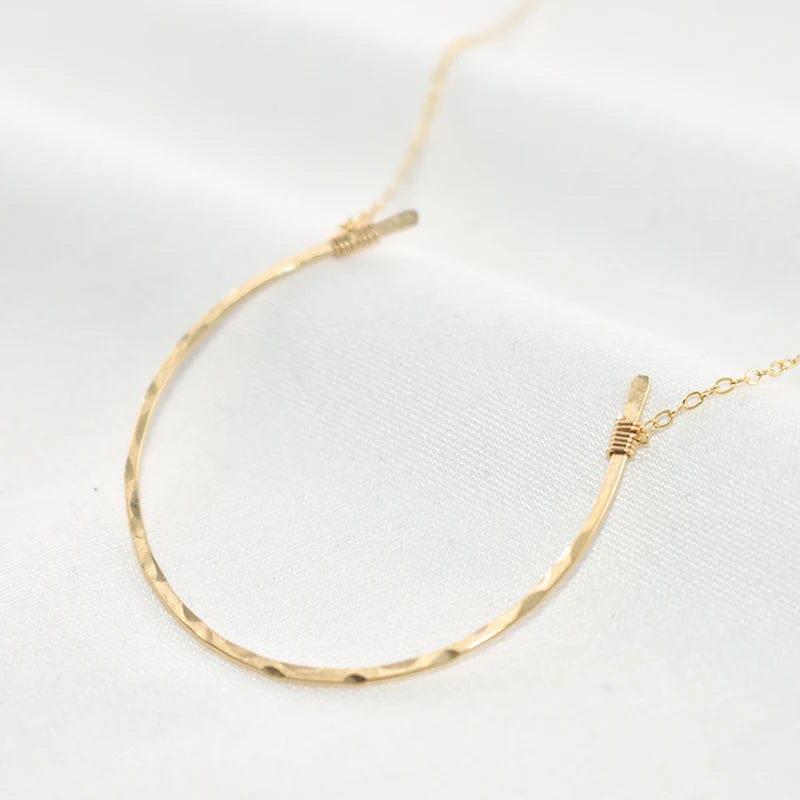 Collier fer à cheval symbolique