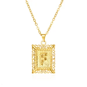 Pendentif dorée lettre "F"
